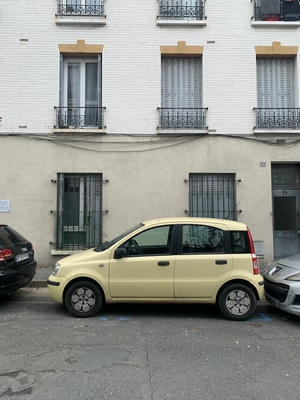 A side view of a yellow car.jpg