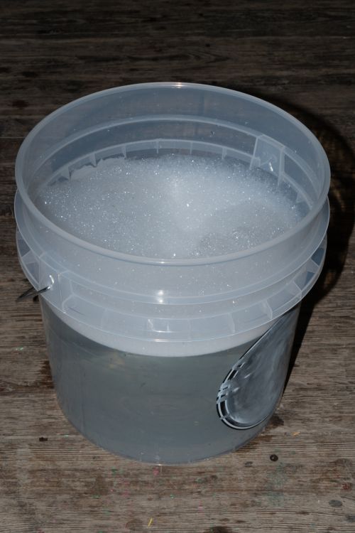 Plastic tub of snow/cum substance